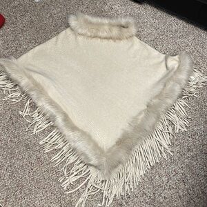 Coeur de vague fur poncho with fringe trim